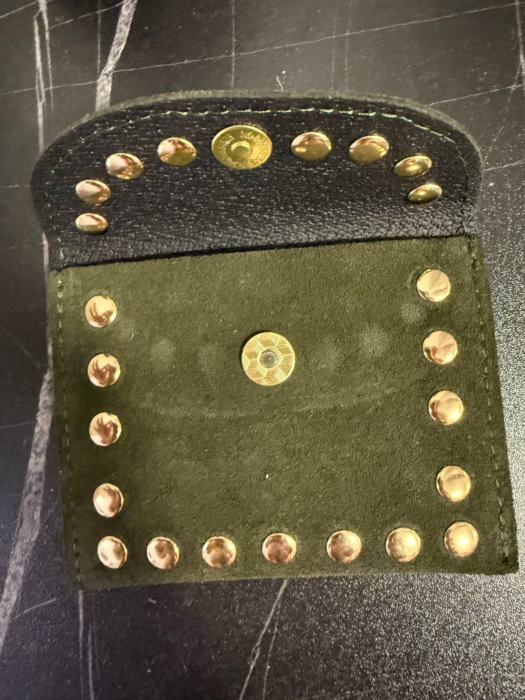 Monedero tachas