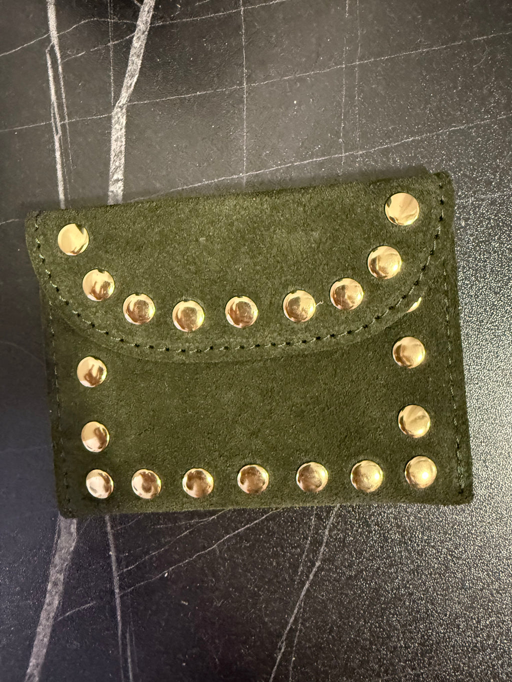 Monedero tachas